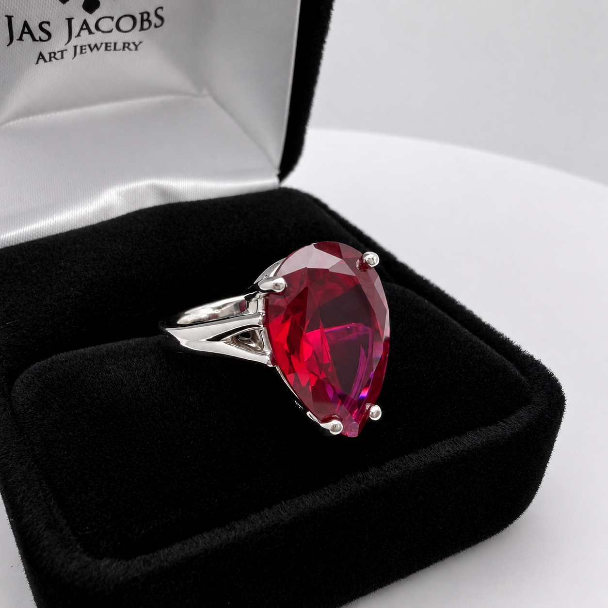 7.5ct Pear Cut Ruby Cathedral Solitaire Ring