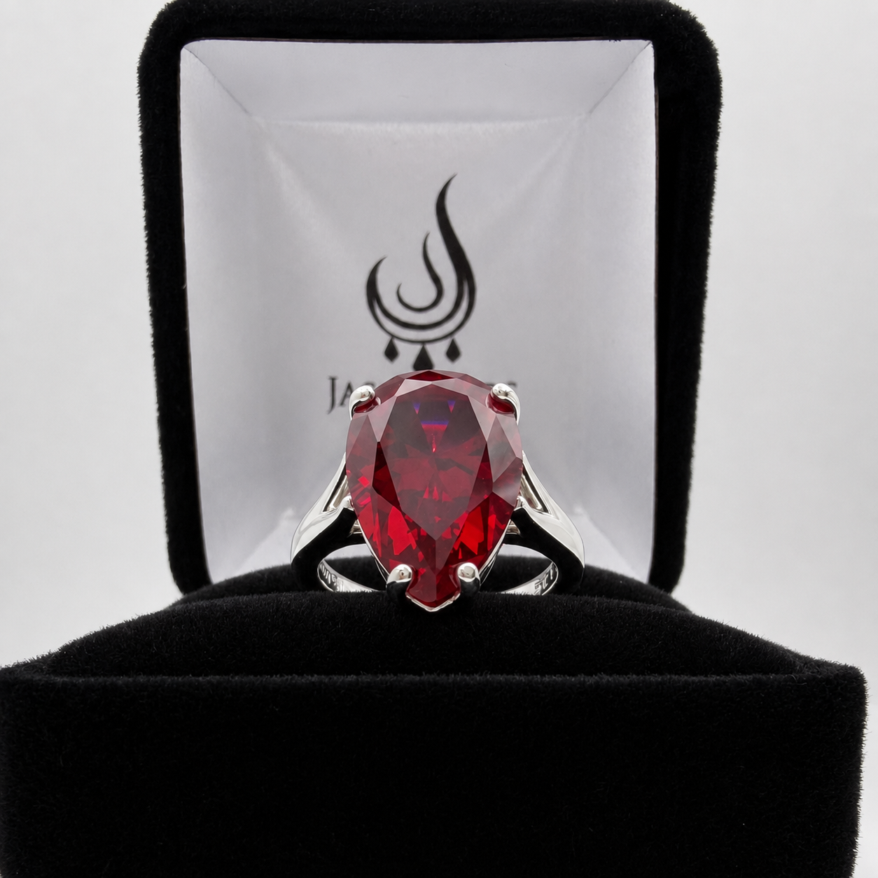 7.5ct Pear Cut Ruby Cathedral Solitaire Ring