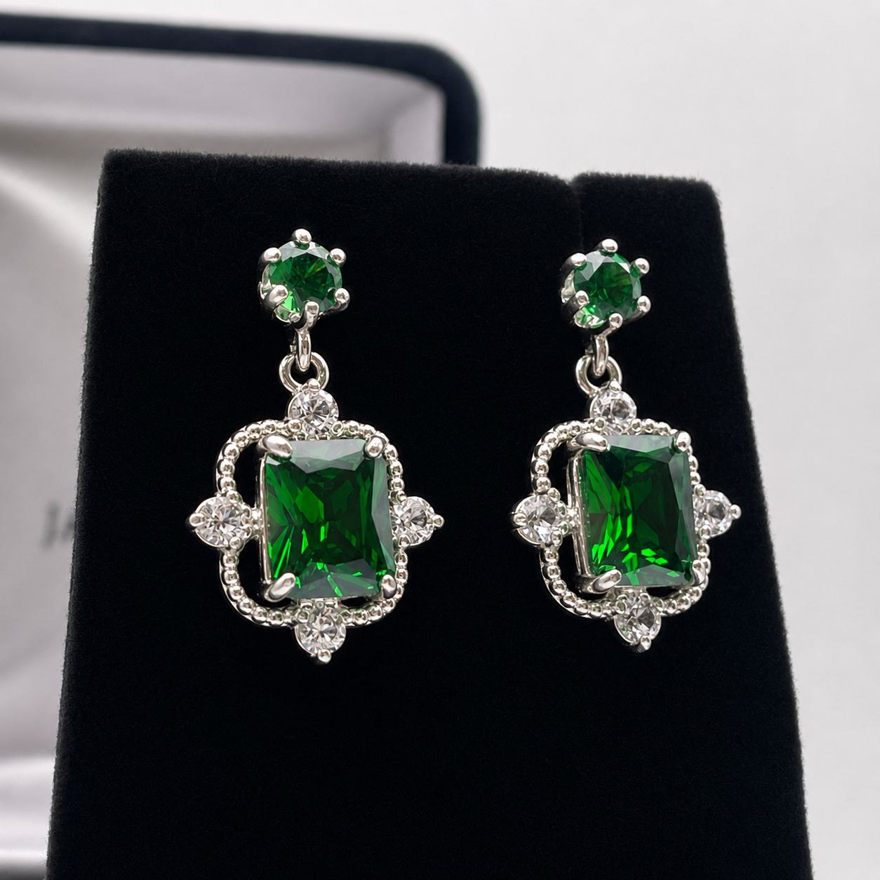 10.4ctw Emerald Cut Emerald Earrings White Sapphire Accents