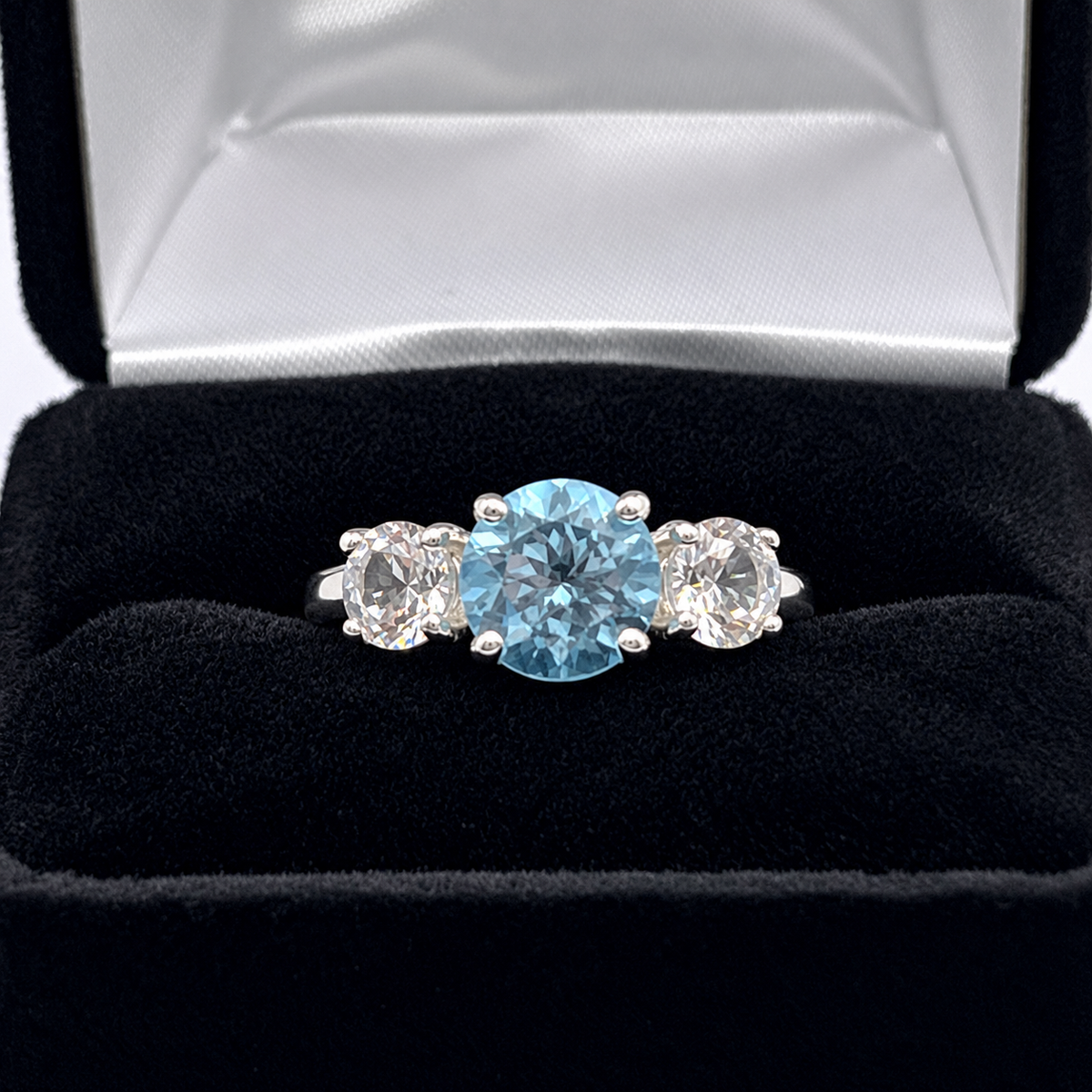 4ct Sky Blue Topaz & White Sapphire Three Stone Ring