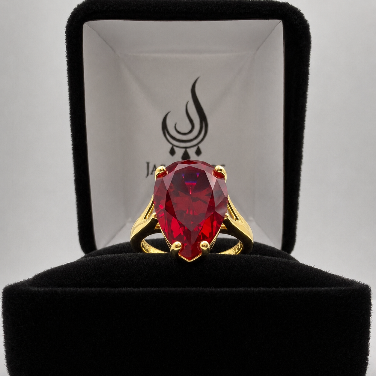 7.5ct Pear Cut Ruby Cathedral Solitaire Ring