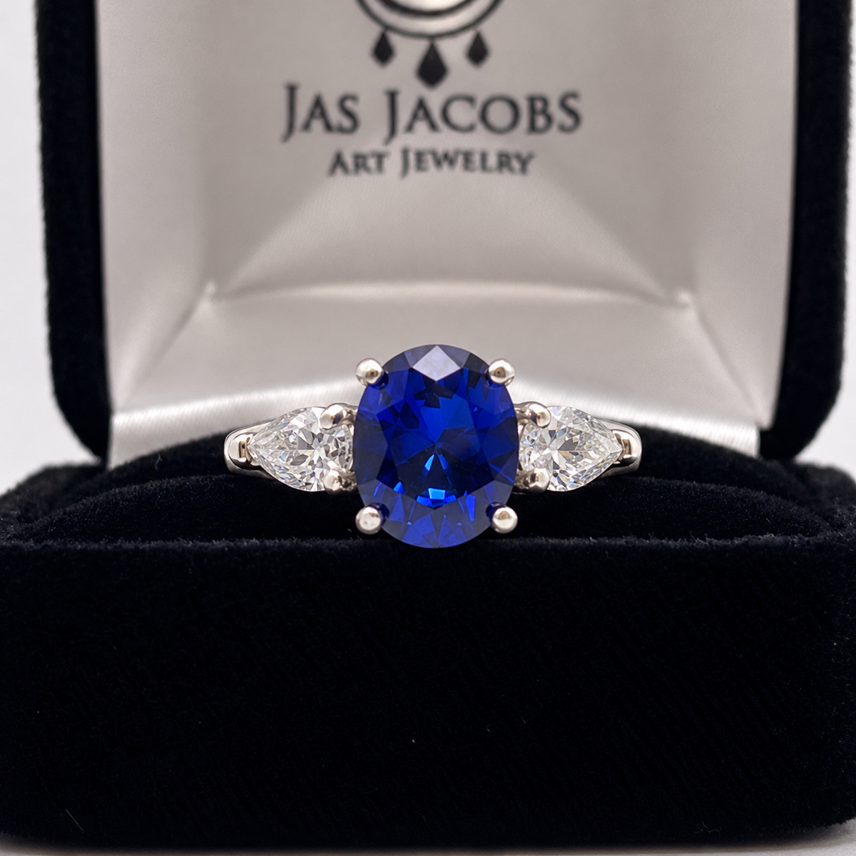 4.5ctw Oval Blue Sapphire & White Sapphire Three Stone Ring