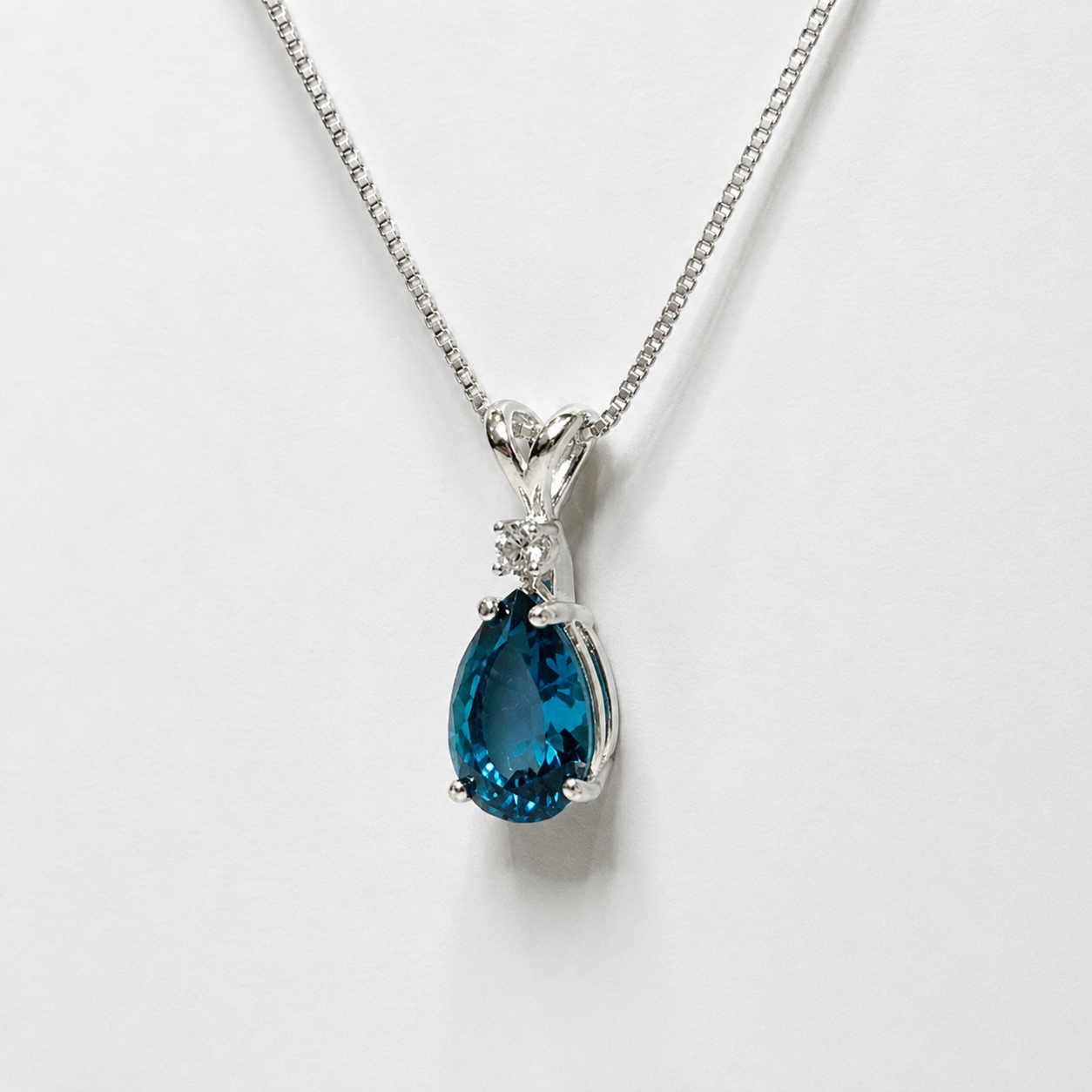 3ct Pear Cut London Blue Spinel Pendant Necklace | White Topaz Accent