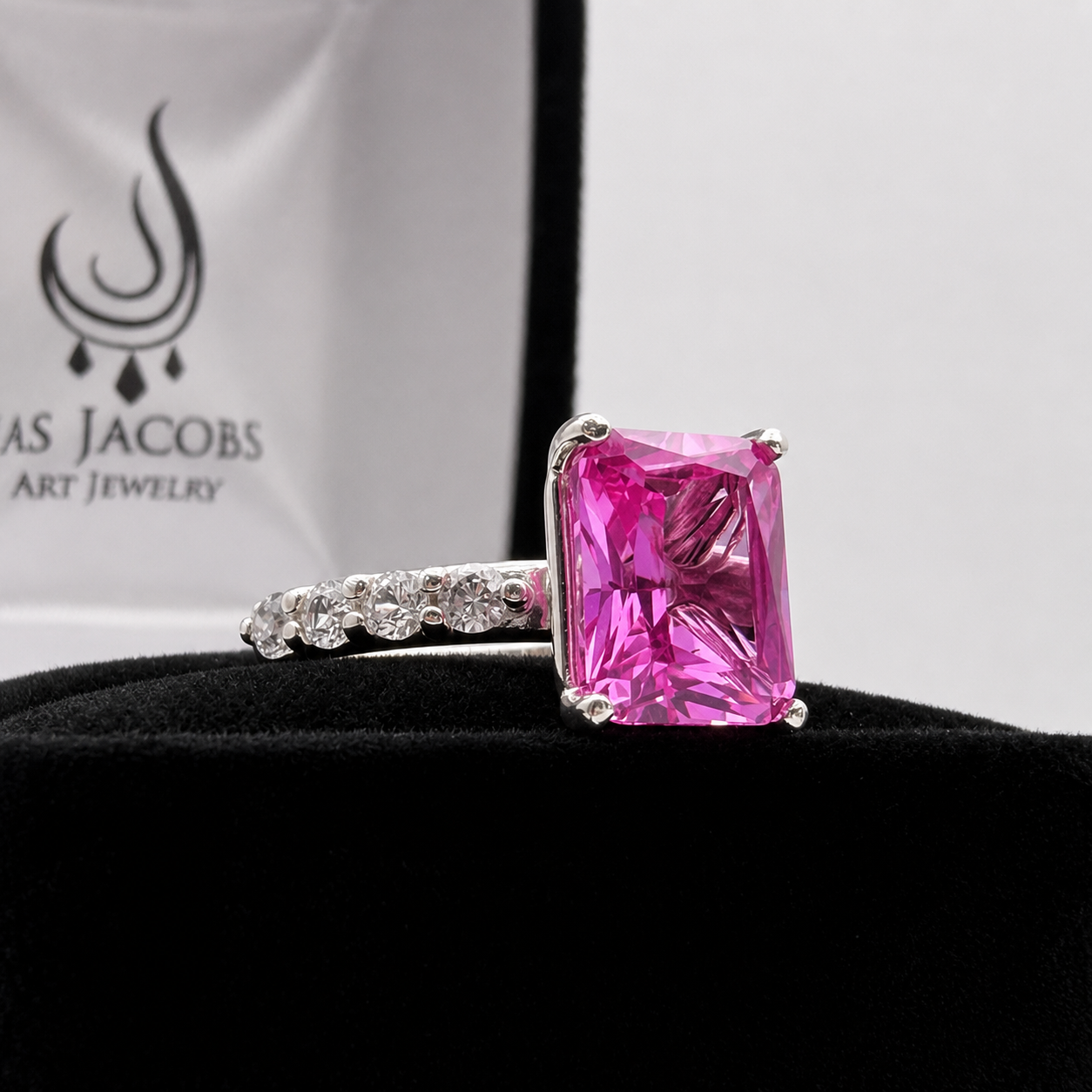 4.64CTW Emerald Cut Pink Sapphire Ring with 8 Brilliant Diamond Accents