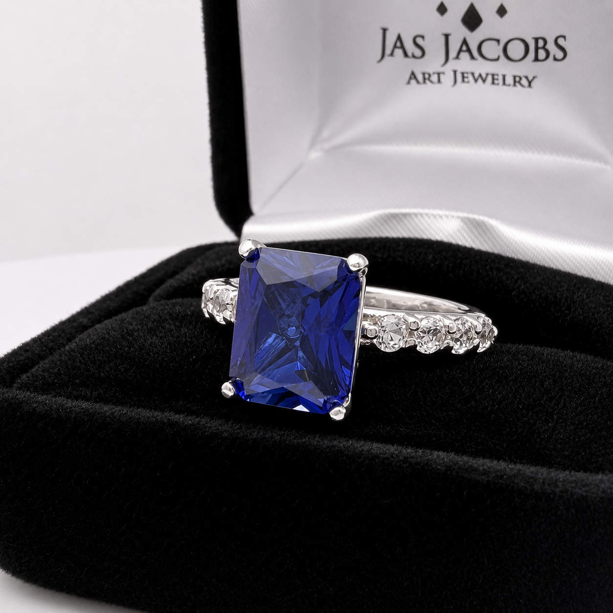 4.64 Carat Emerald Cut Blue Sapphire Ring with Diamond Accents