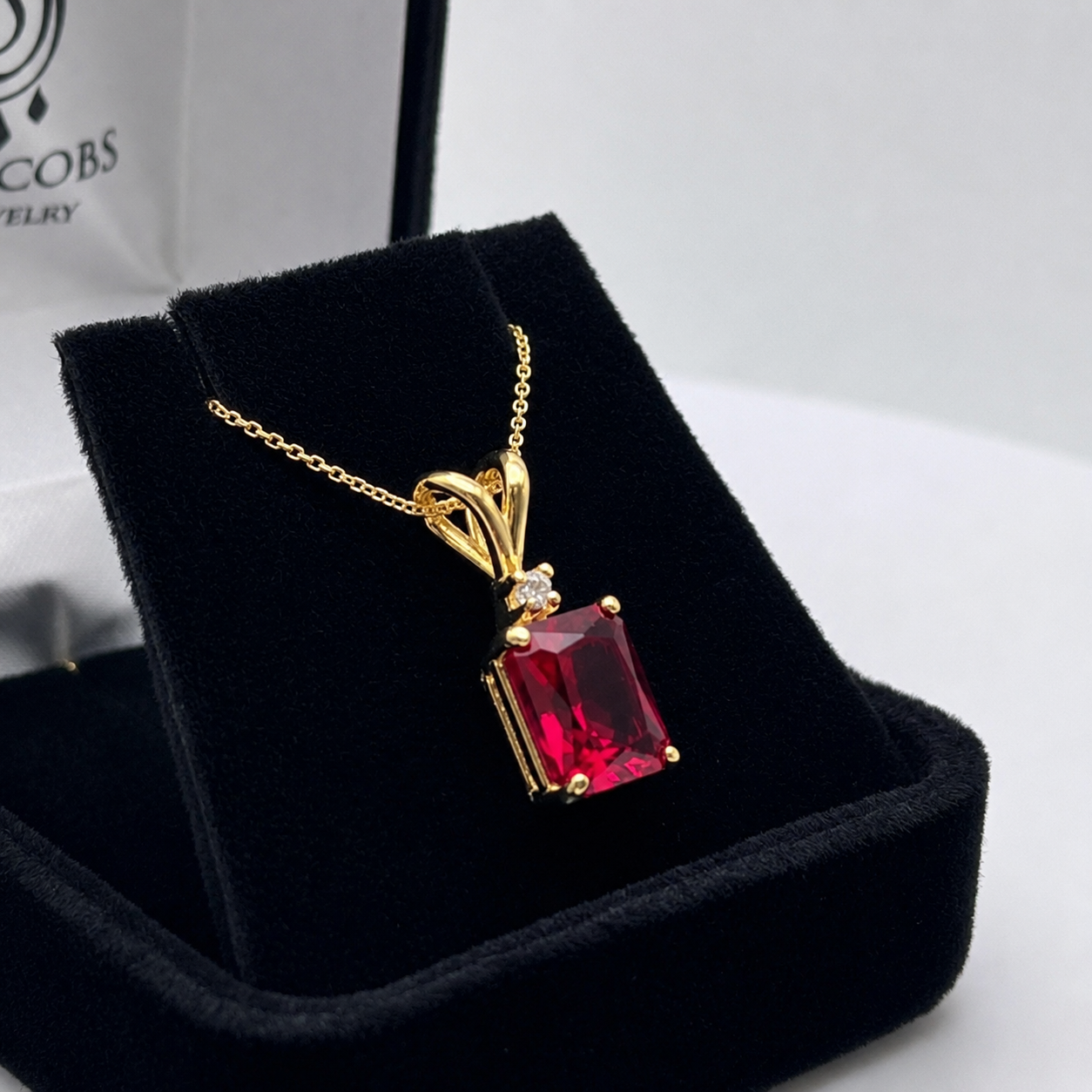 3CTW Emerald Cut Ruby Pendant Necklace | Diamond Accent