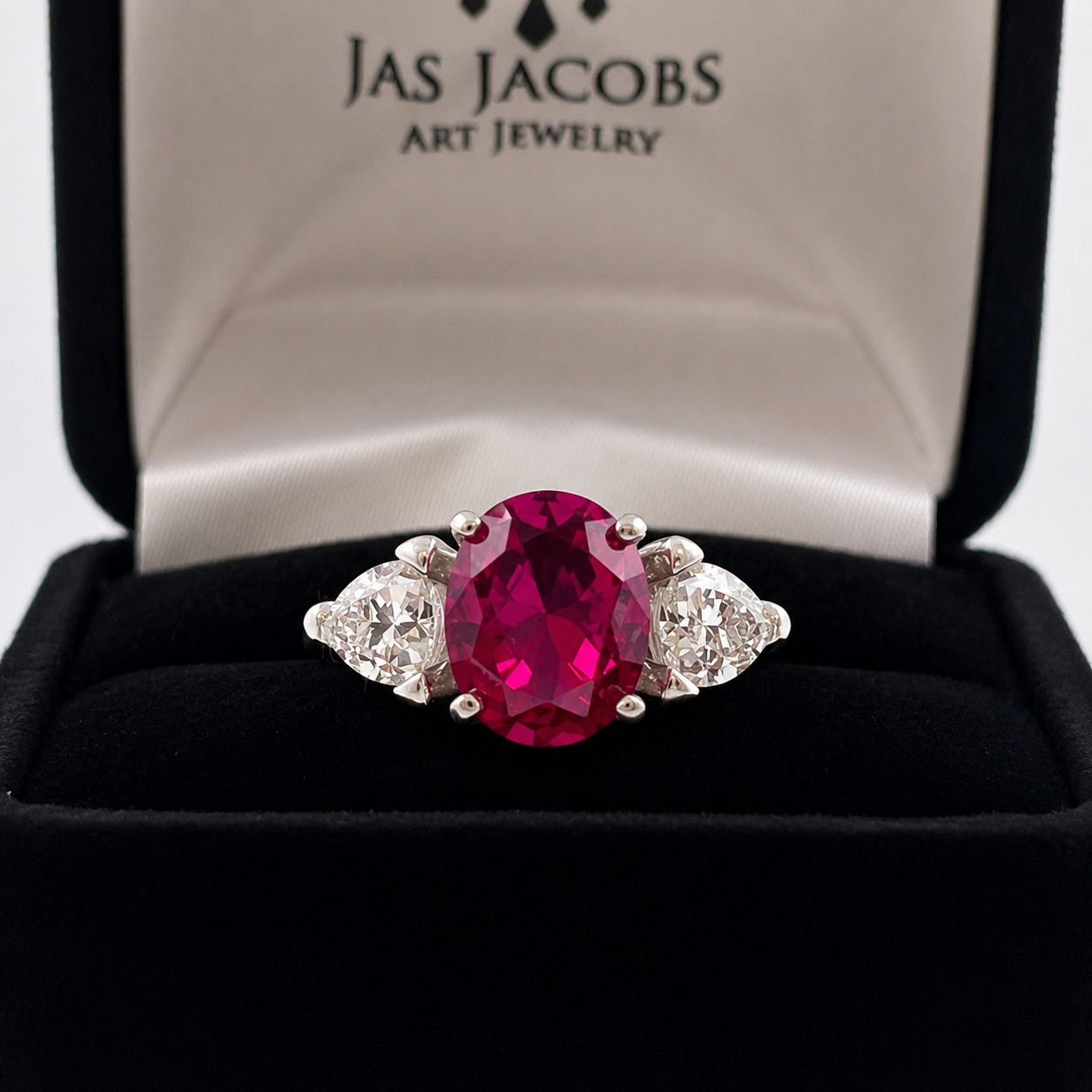 4.5ctw Oval Cut Ruby & Trillion Cut White Sapphire Three Stone Ring