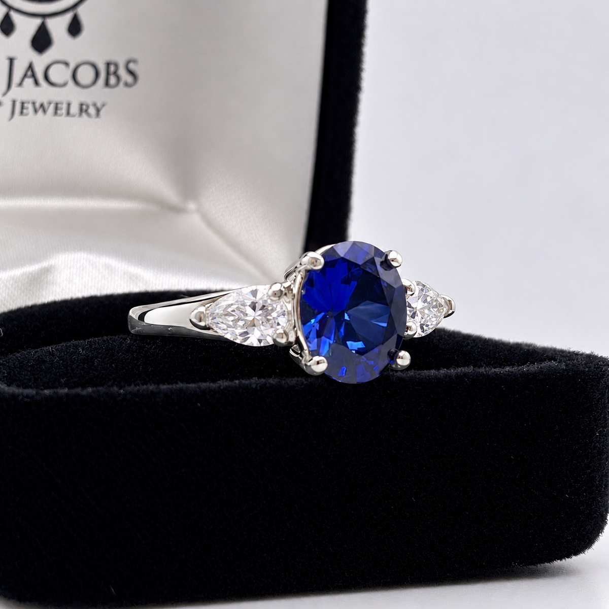 4.5ctw Oval Blue Sapphire & Diamond Three Stone Ring