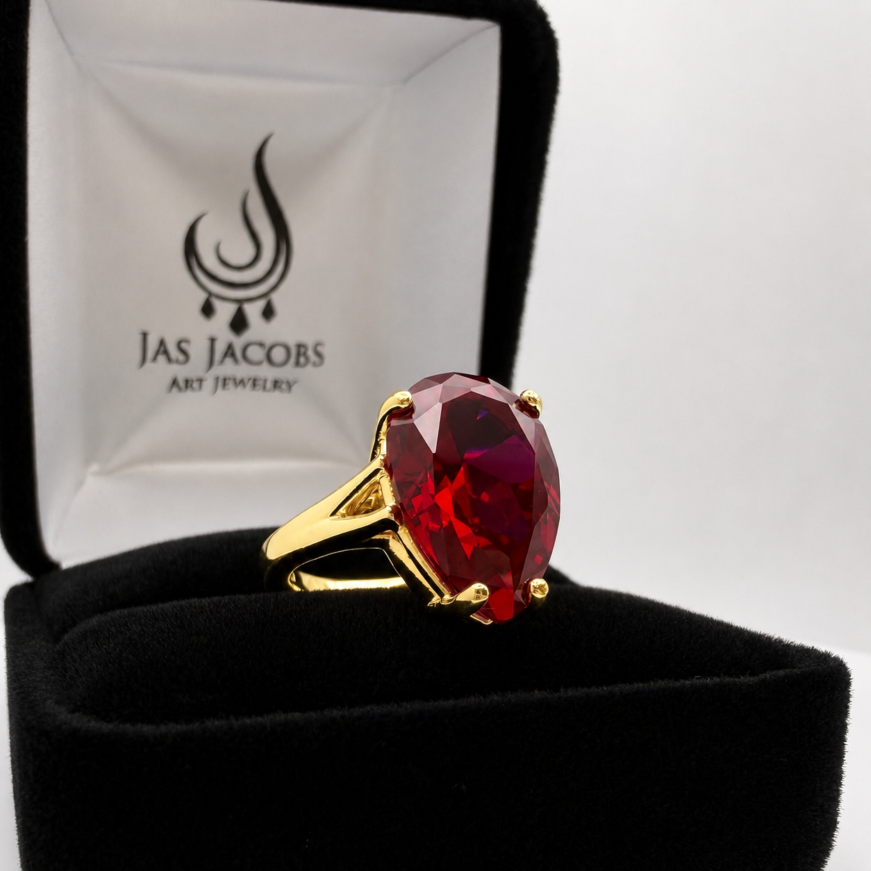 7.5ct Pear Cut Ruby Cathedral Solitaire Ring