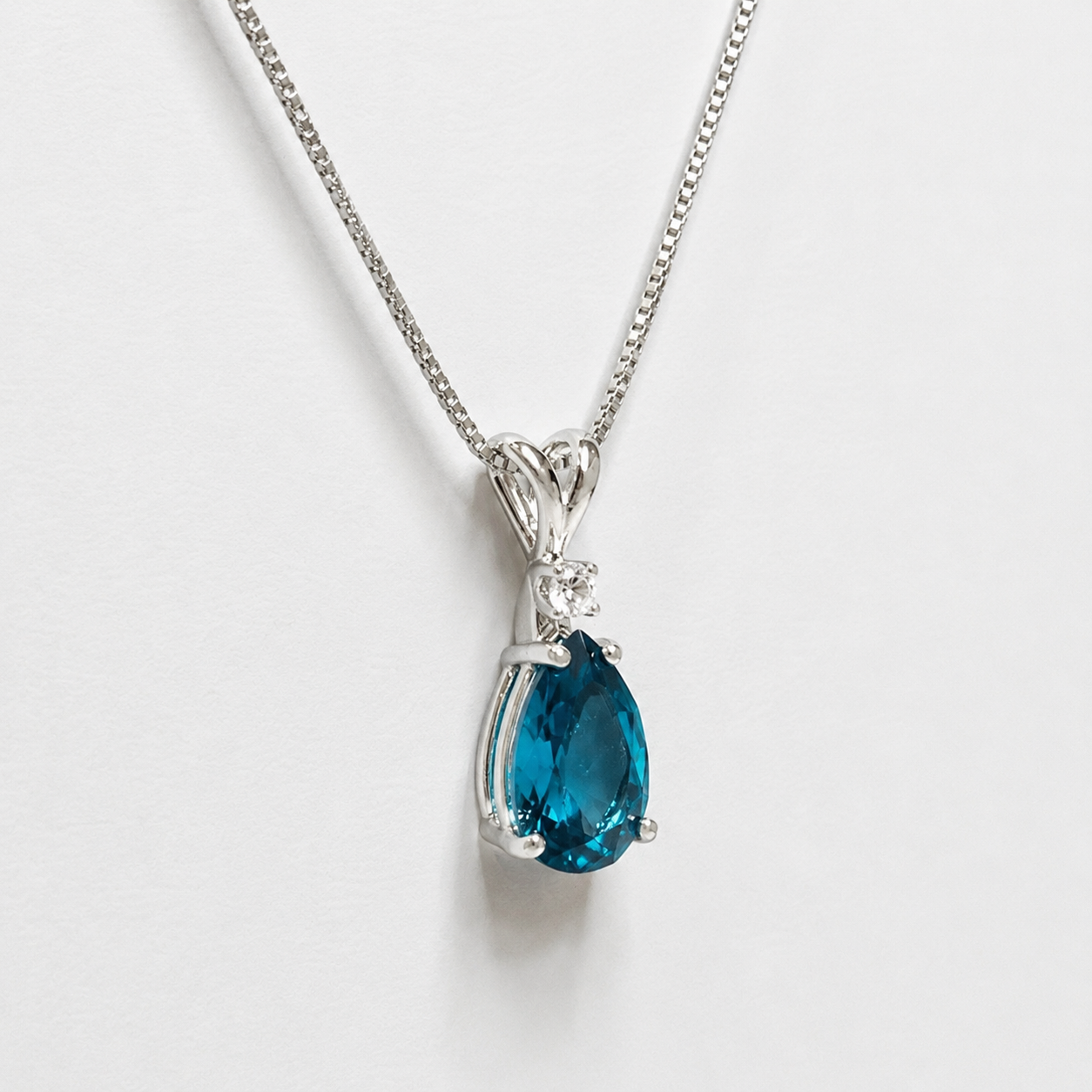 3ct Pear Cut London Blue Spinel Pendant Necklace | White Topaz Accent