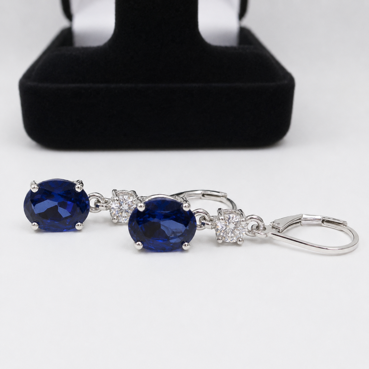 6.4 CTW Oval Cut Blue Sapphire & White Sapphire Earrings