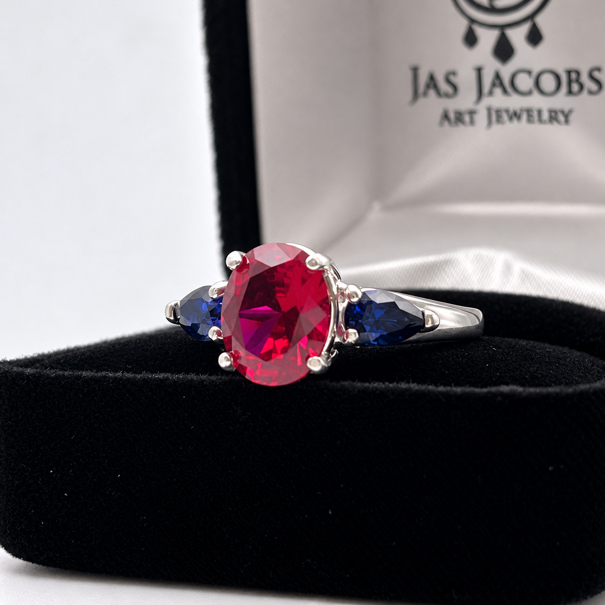 4.5ctw Oval Ruby & Blue Sapphire Three-Stone Statement Ring