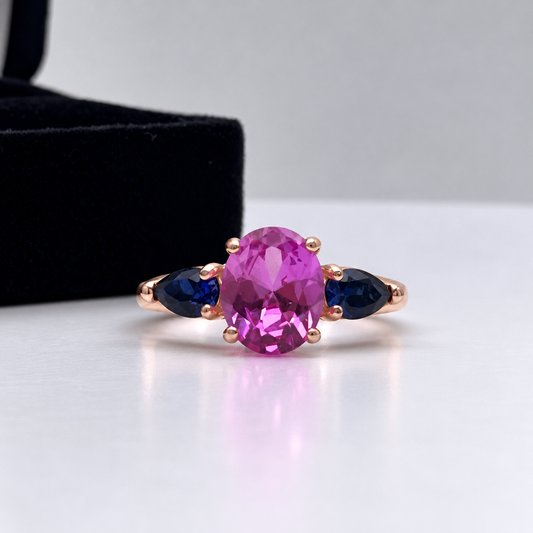 4.5ctw Oval Cut Pink & Blue Sapphire Three-Stone Ring