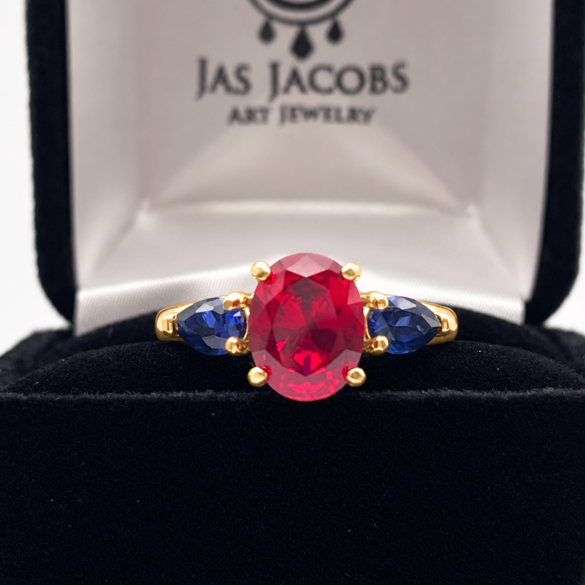 4.5ctw Oval Ruby & Blue Sapphire Three-Stone Statement Ring