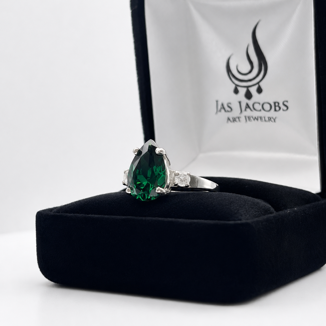 3.7CTW Pear Cut Emerald Ring with White Sapphire Accents