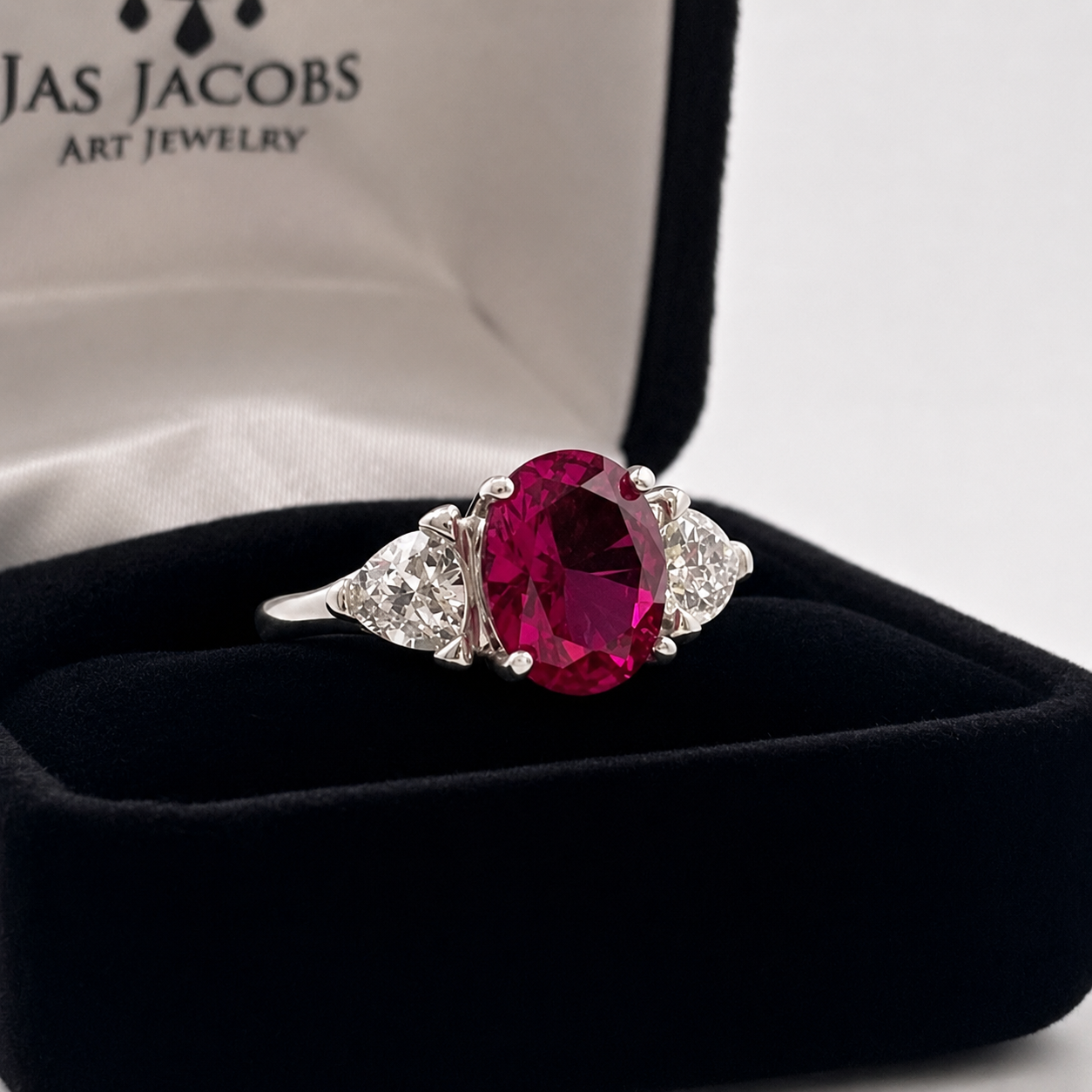 4.5ctw Oval Cut Ruby & Trillion Cut White Sapphire Three Stone Ring