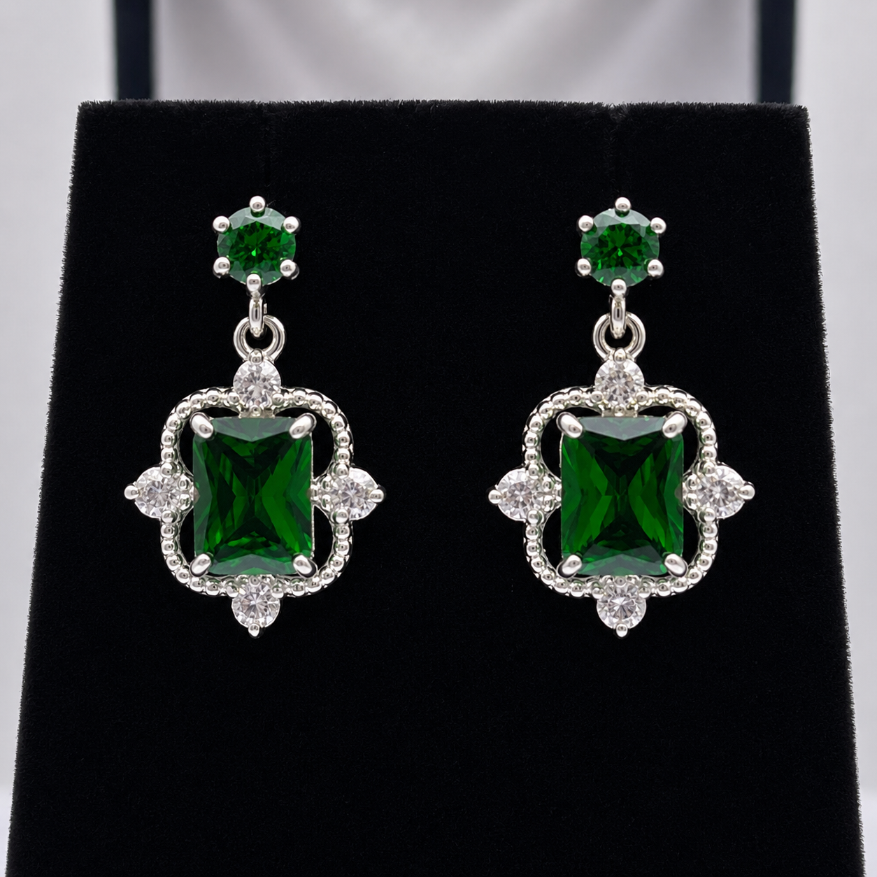10.4ctw Emerald Cut Emerald Earrings White Sapphire Accents