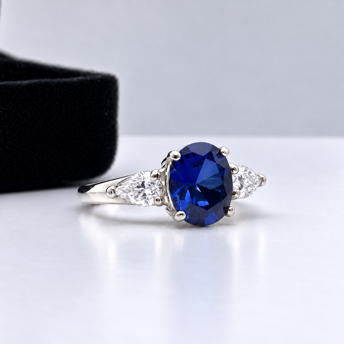 4.5ctw Oval Blue Sapphire & Diamond Three Stone Ring