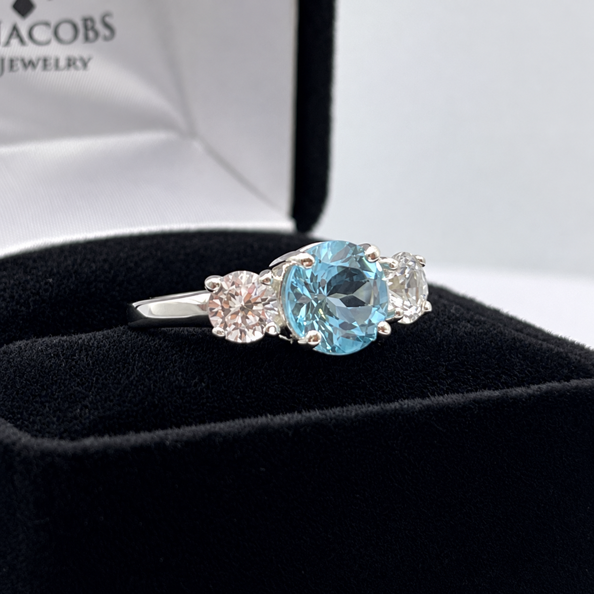 4ct Sky Blue Topaz & White Sapphire Three Stone Ring