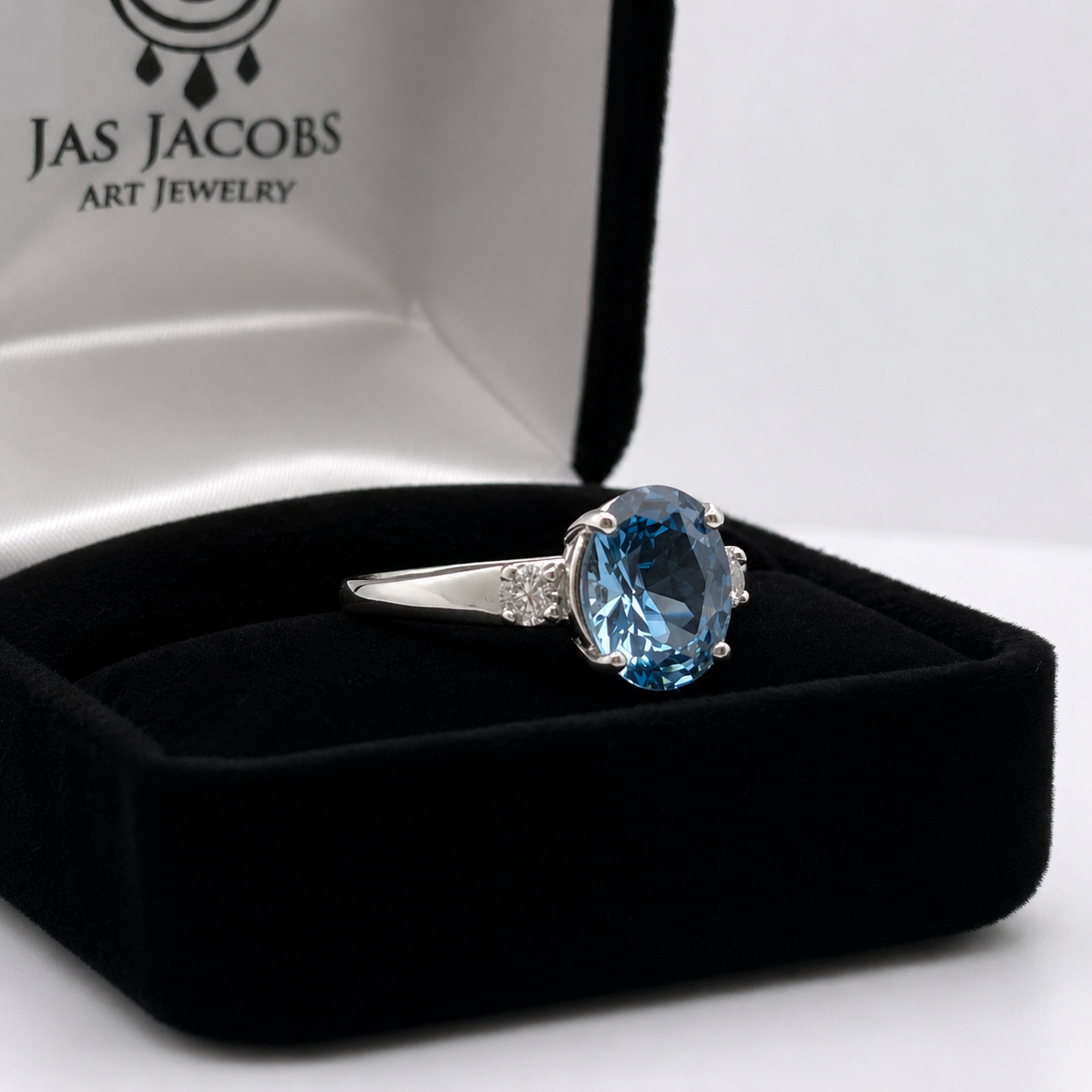 2.6CTW Oval Cut Blue Topaz Ring | White Sapphire Accents