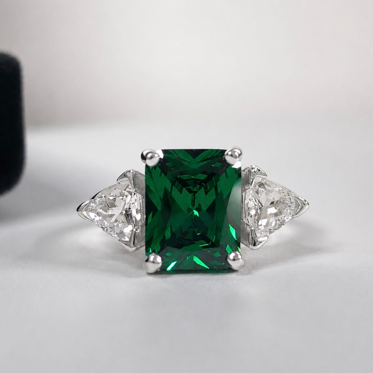 4.5CTW Emerald Cut Emerald Ring | Trillion White Sapphire Three Stone Ring