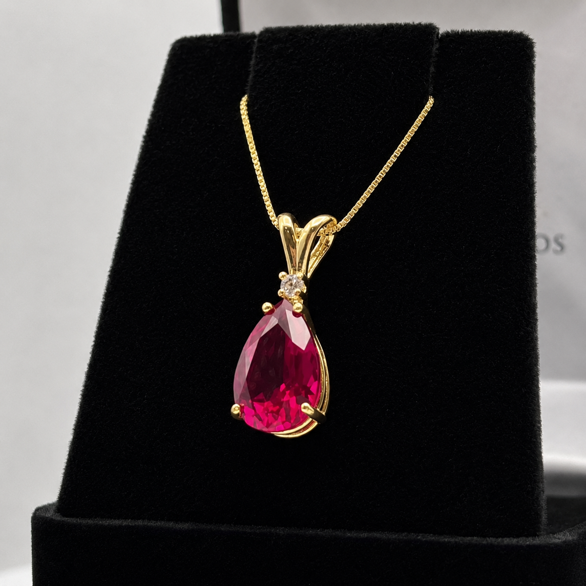 7.5ct Pear Cut Ruby Pendant Necklace with Diamond Accent in 14k Gold