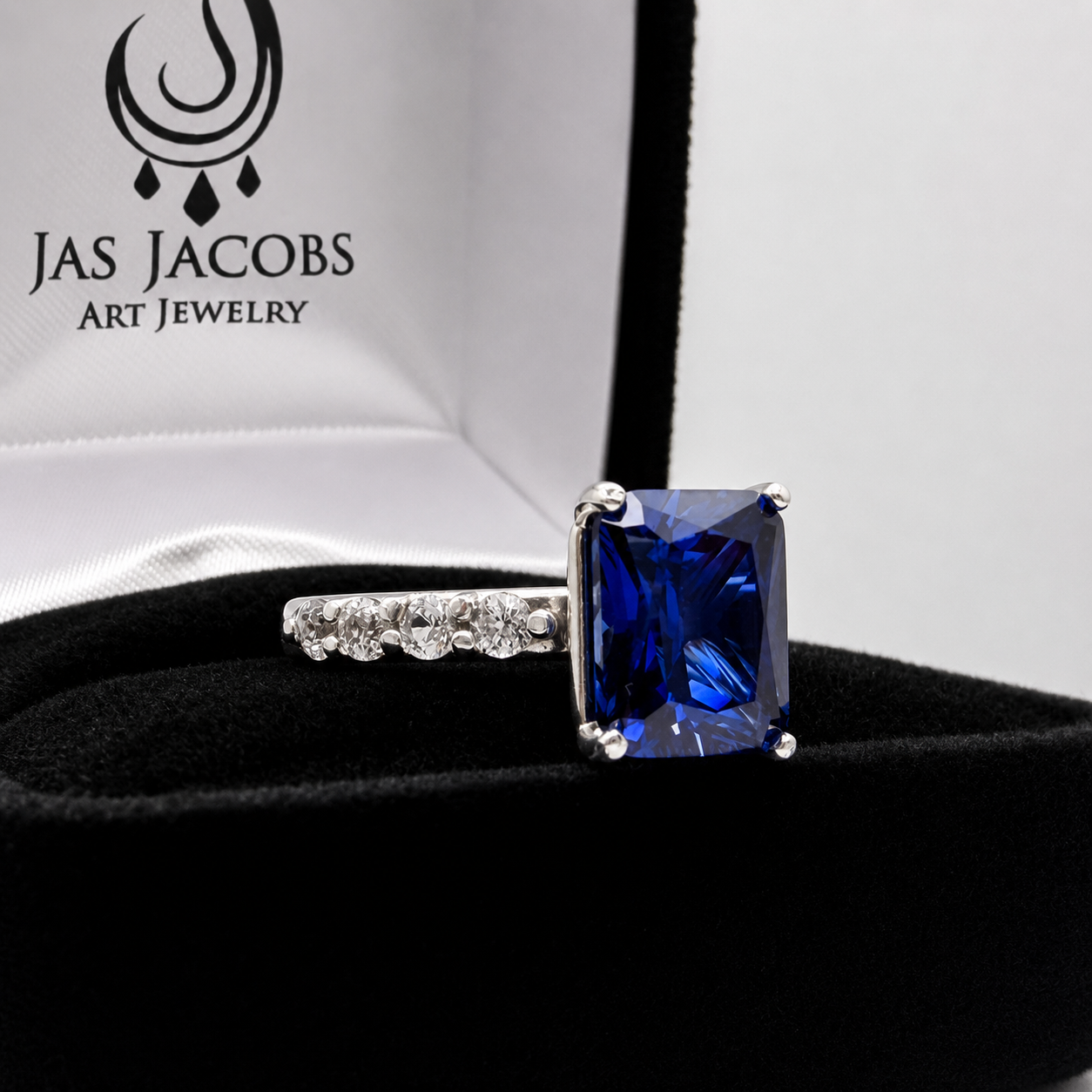 4.64 Carat Emerald Cut Blue Sapphire Ring with Diamond Accents
