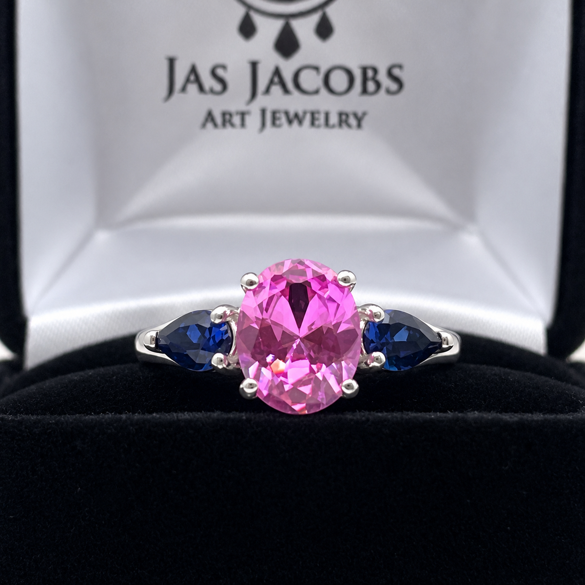 4.5ctw Oval Cut Pink & Blue Sapphire Three-Stone Ring