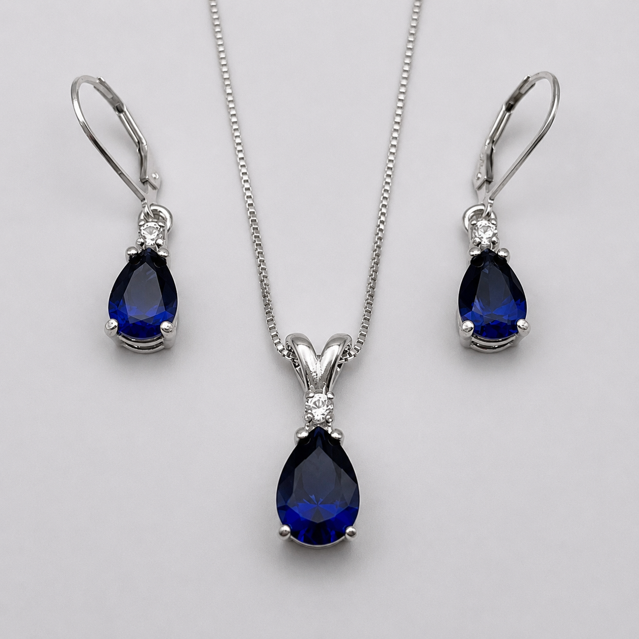 5.5 CTW Pear Cut Blue & White Sapphire Jewelry Set