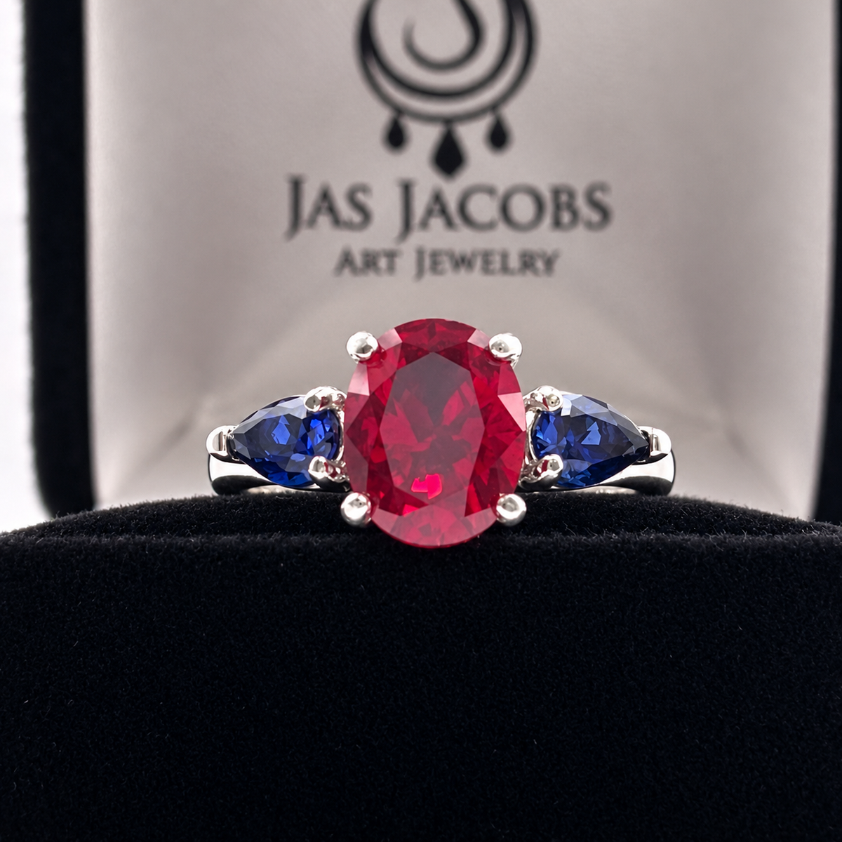 4.5ctw Oval Ruby & Blue Sapphire Three-Stone Statement Ring