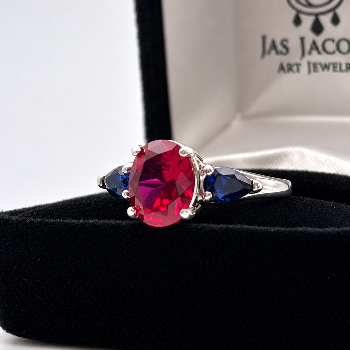 4.5ctw Oval Ruby & Blue Sapphire Three-Stone Statement Ring