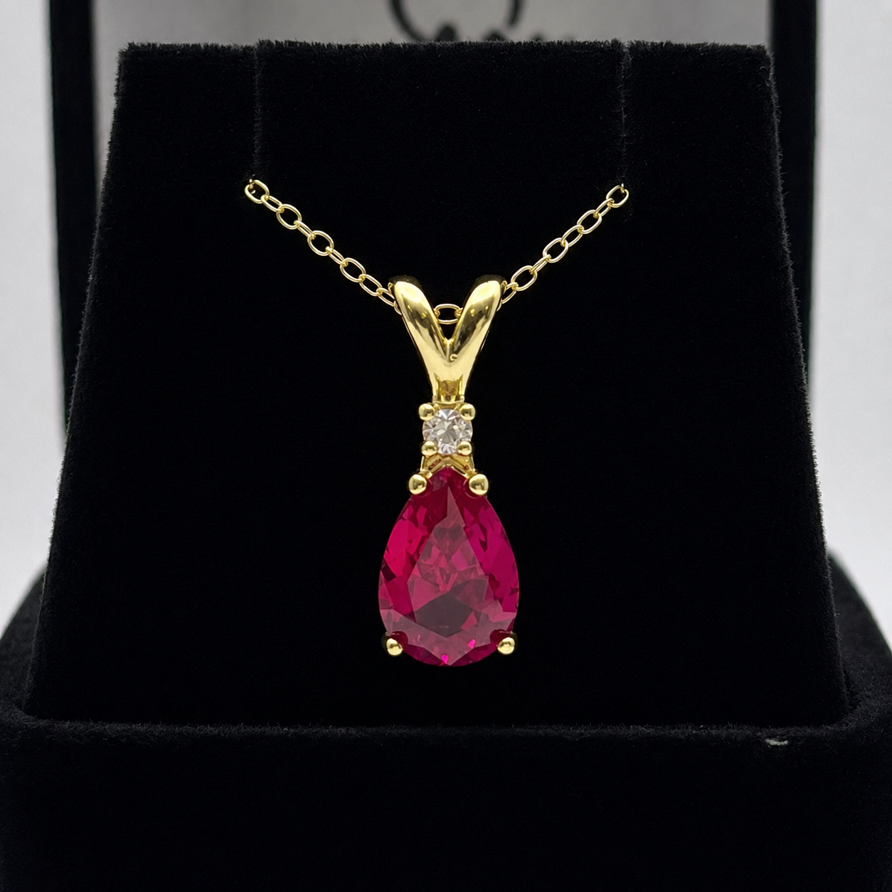 2.2CT Pear Cut Ruby Pendant Necklace | Diamond Accent