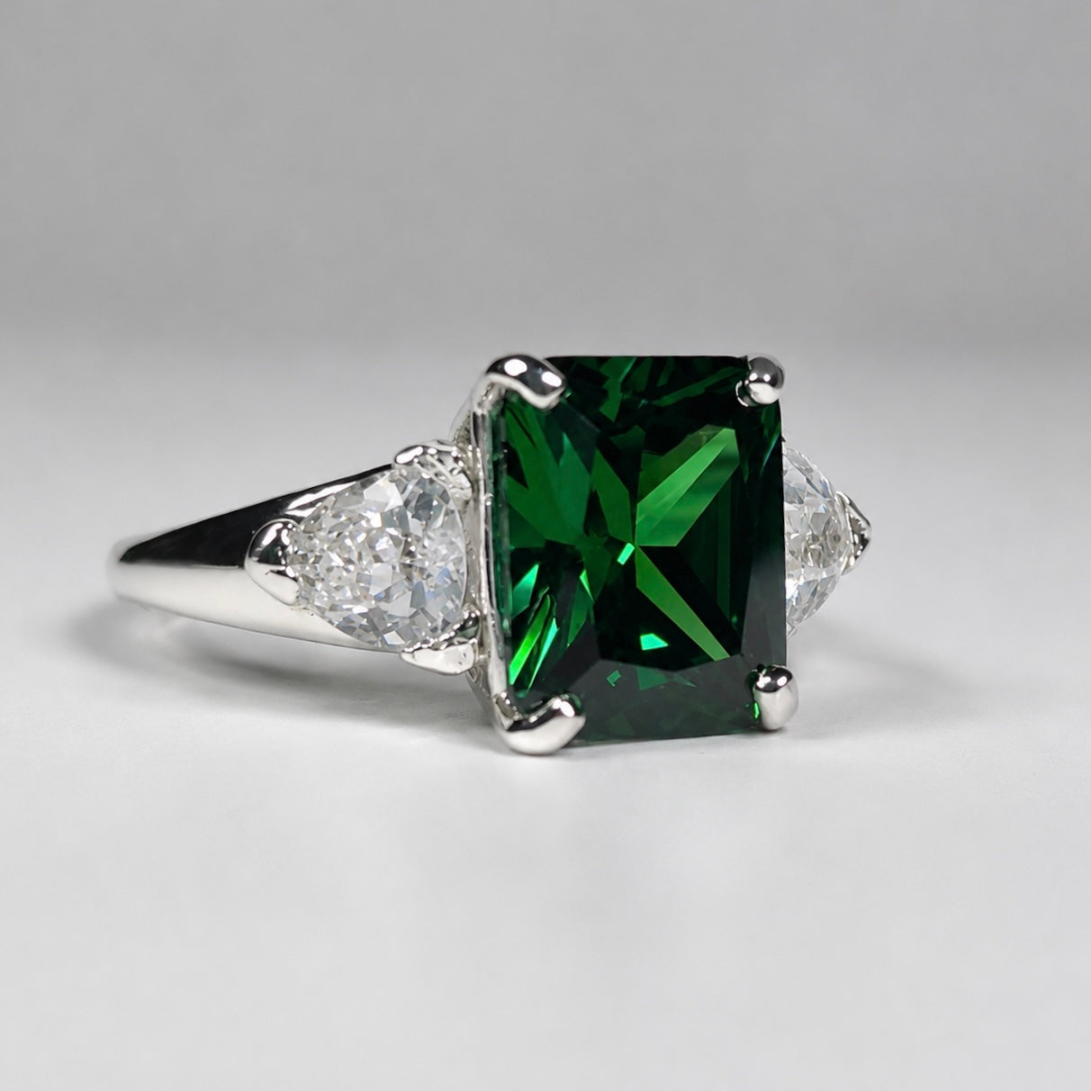 4.5CTW Emerald Cut Emerald Ring | Trillion White Sapphire Three Stone Ring