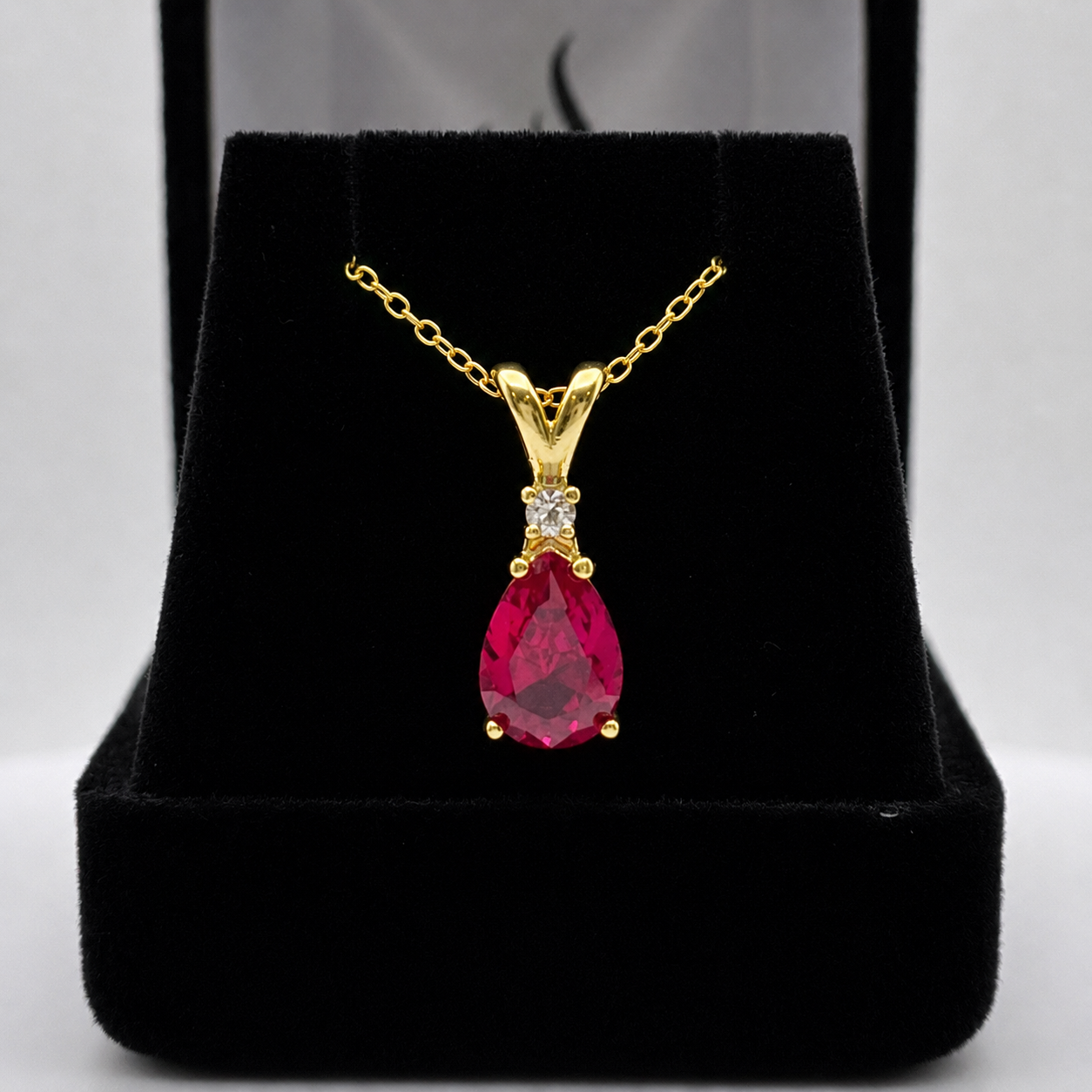 2.2CT Pear Cut Ruby Pendant Necklace | Diamond Accent