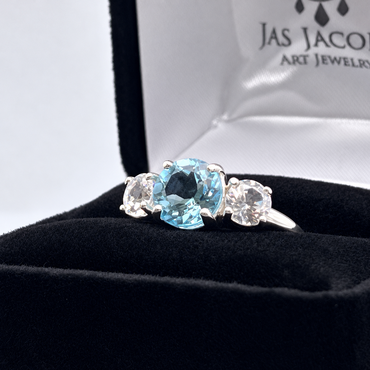 4ct Sky Blue Topaz & White Sapphire Three Stone Ring