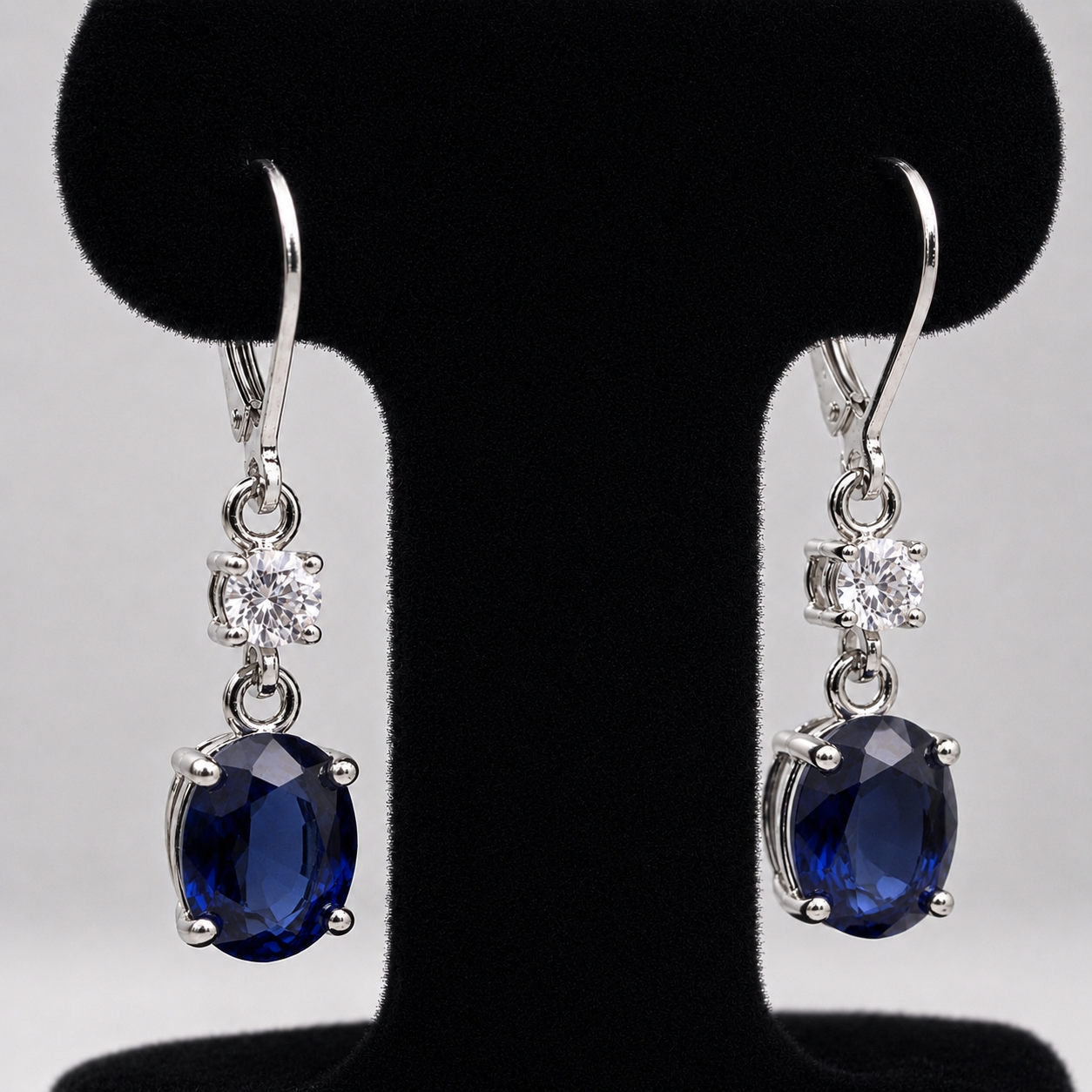 6.4 CTW Oval Cut Blue Sapphire & White Sapphire Earrings