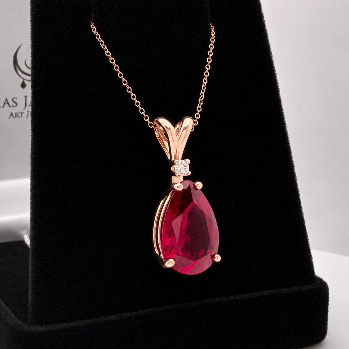 7.5ct Pear Cut Ruby Pendant Necklace with White Sapphire Accent