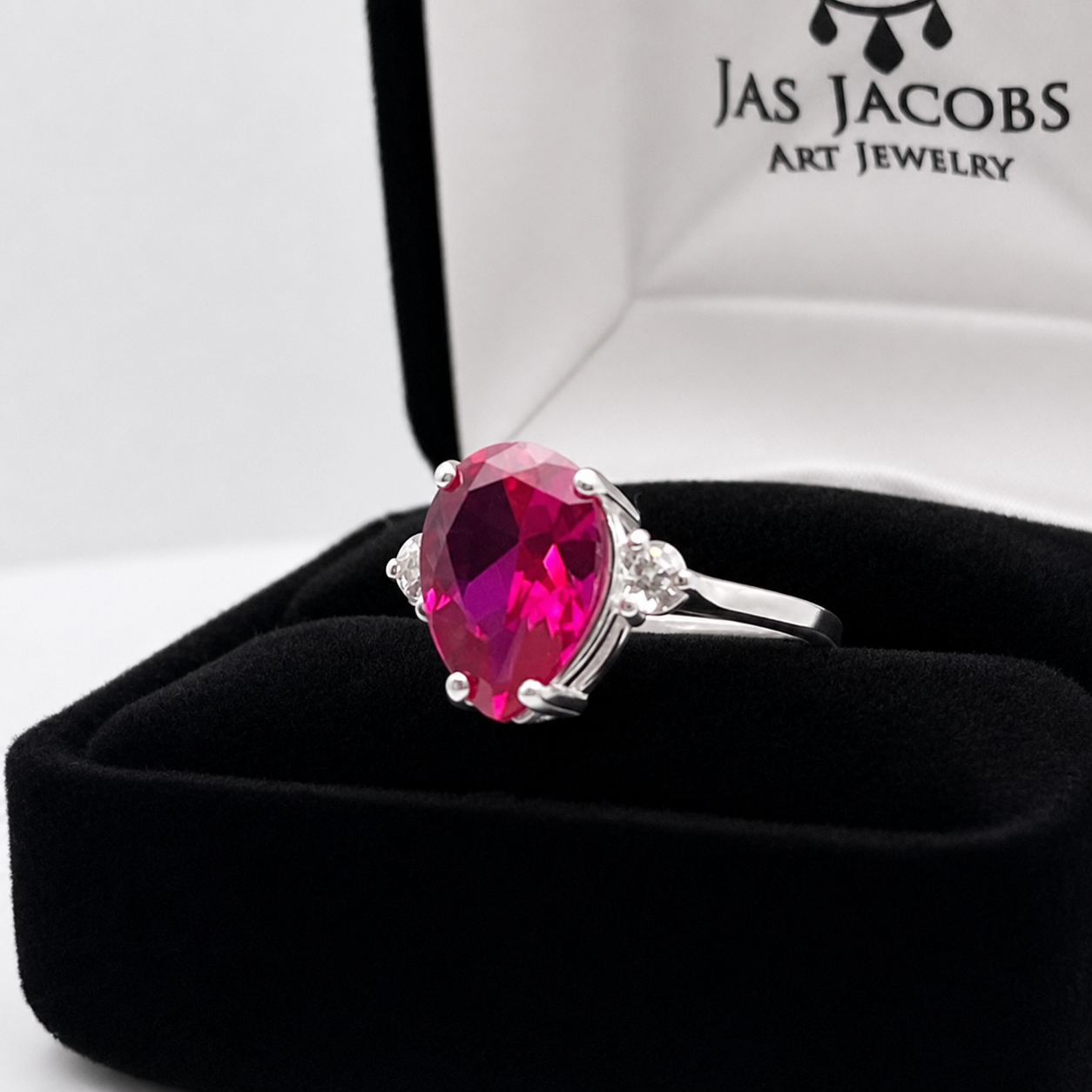 4.7CTW Pear Cut Ruby Ring with White Sapphire Accents