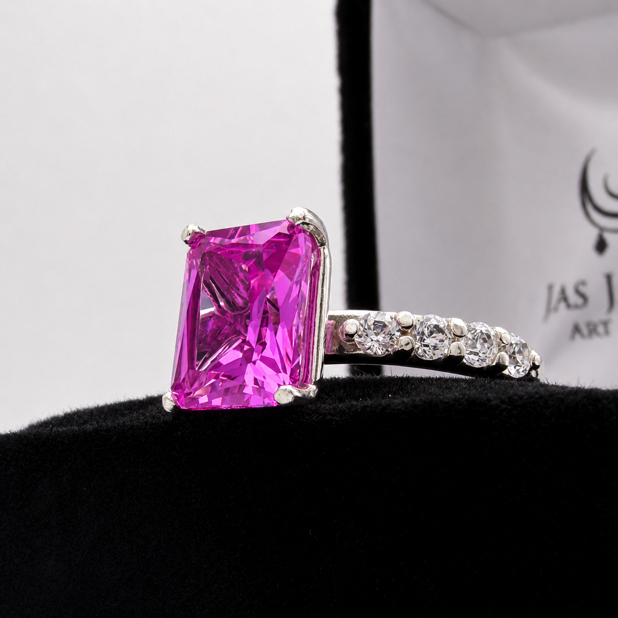 4.64CTW Emerald Cut Pink Sapphire Ring with 8 Brilliant Diamond Accents