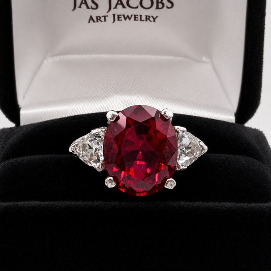 6.5ctw Oval Cut Ruby & Trillion Cut White Sapphire Three Stone Ring