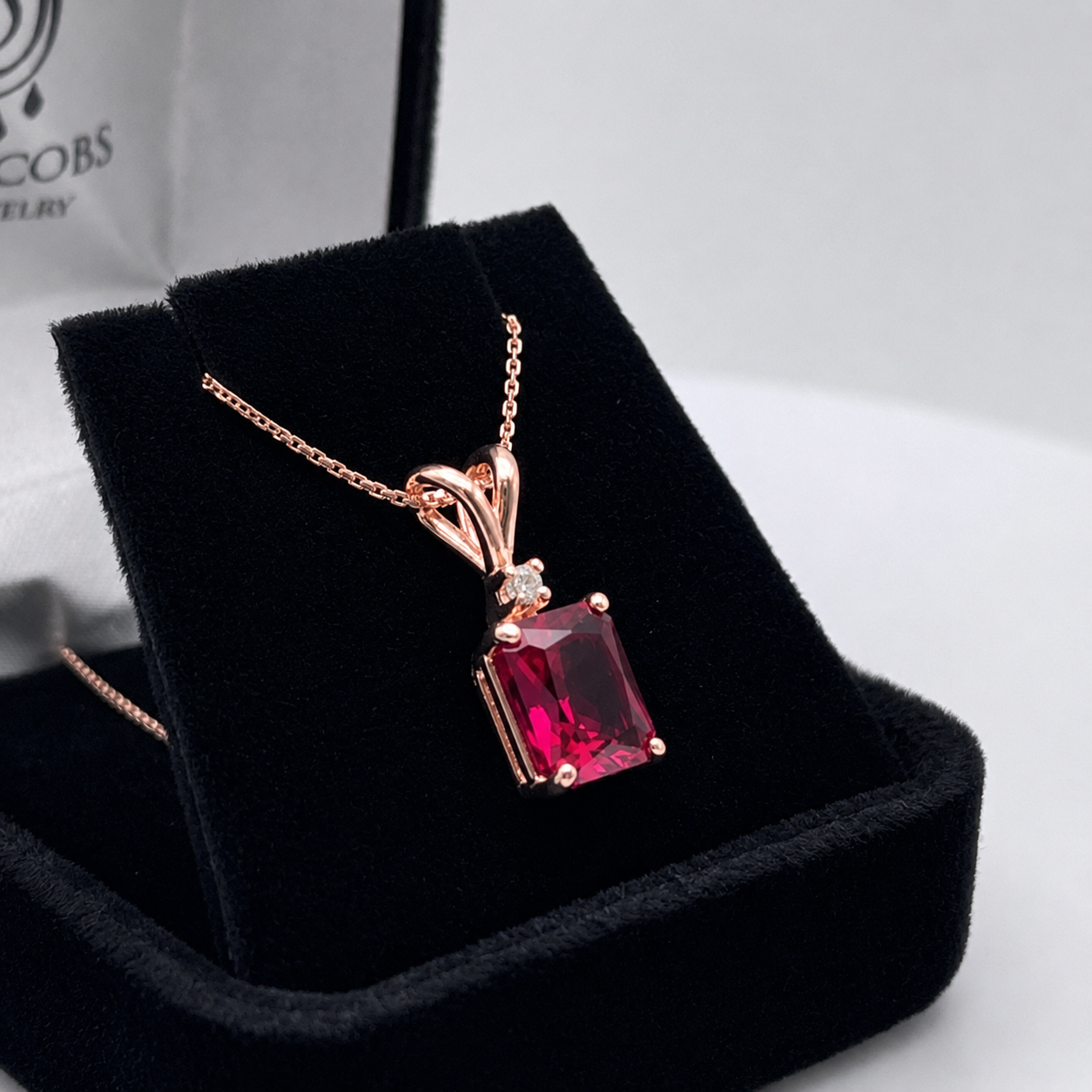 3CTW Emerald Cut Ruby Pendant Necklace | Diamond Accent