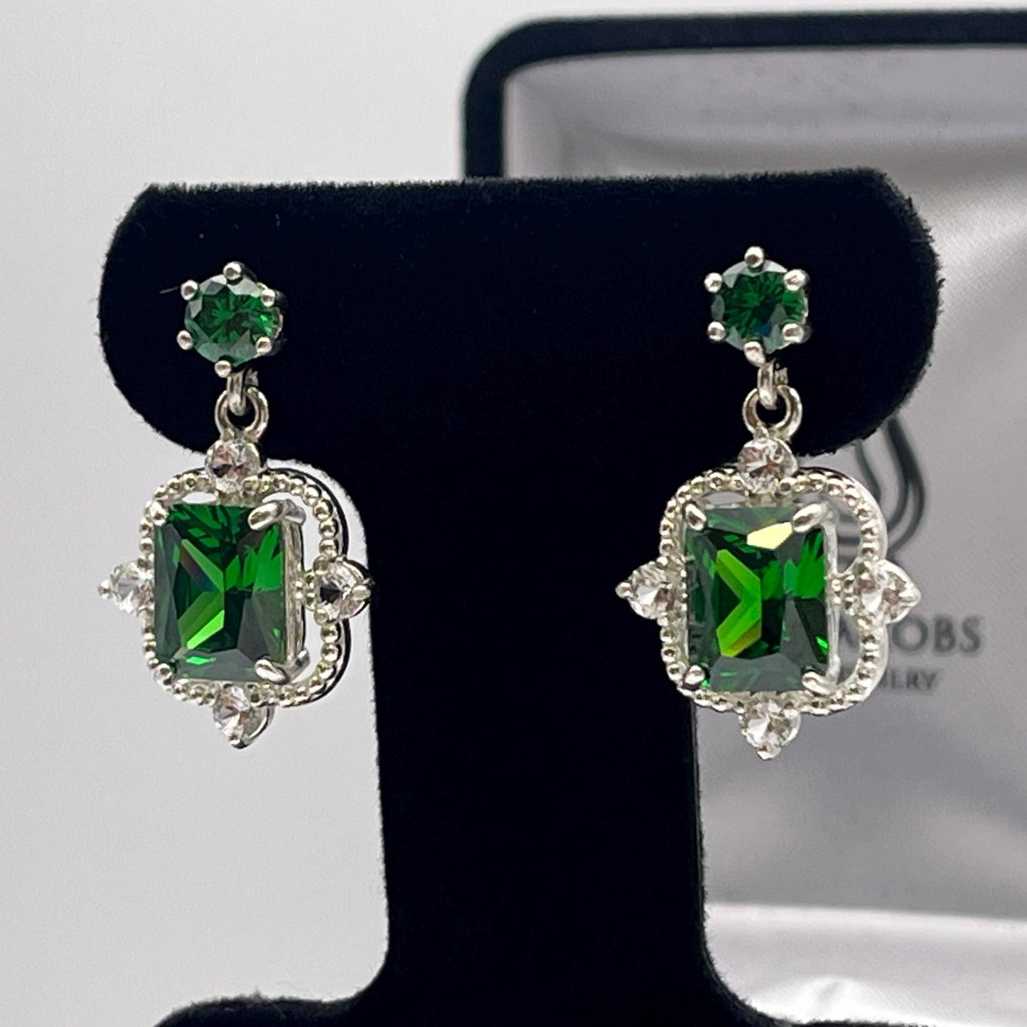 Gorgeous 10.4ctw Emerald Cut Emerald Earrings White Sapphire Accents