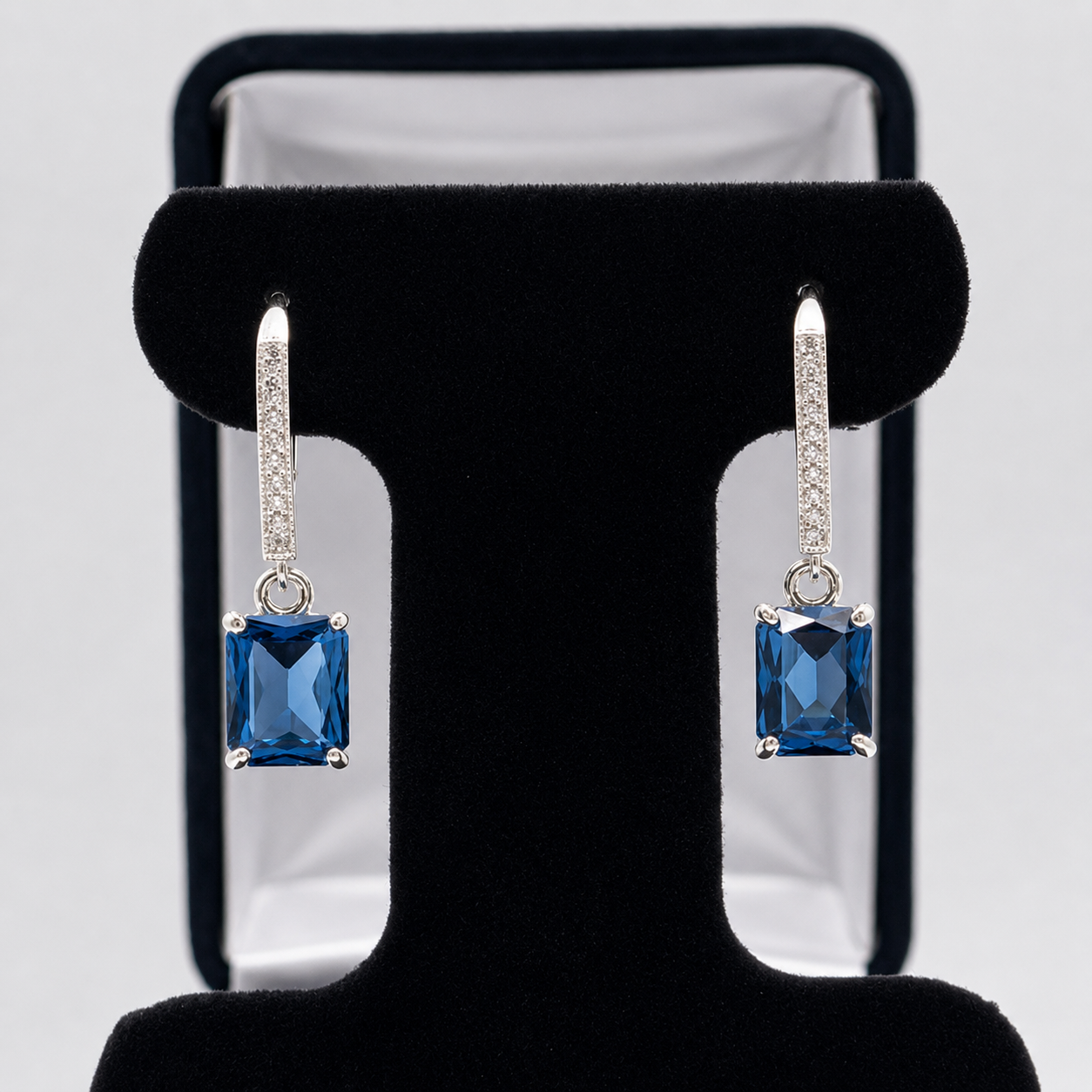 5.2ctw Emerald Cut London Blue Spinel & White Topaz Leverback Earrings