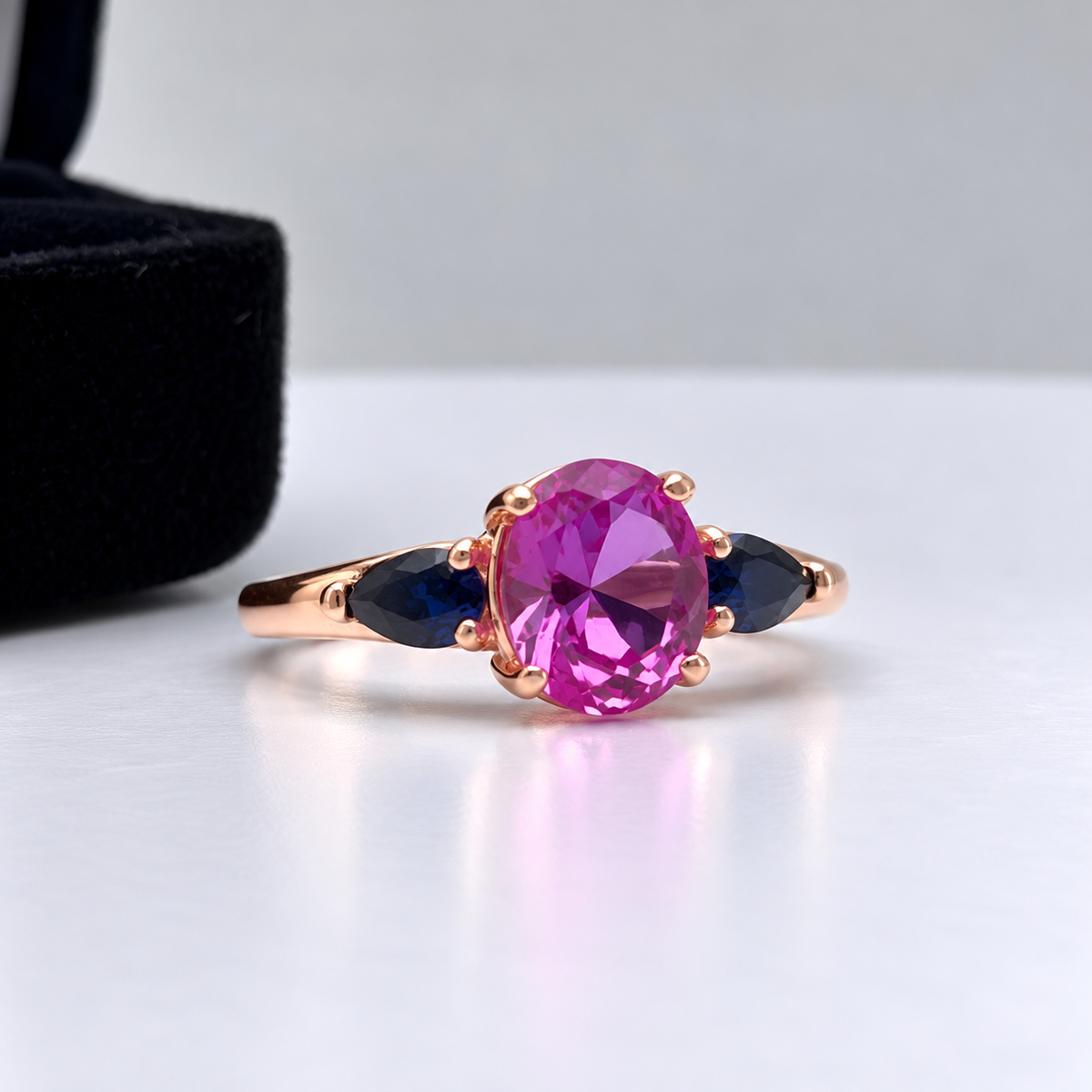 4.5ctw Oval Cut Pink & Blue Sapphire Three-Stone Ring
