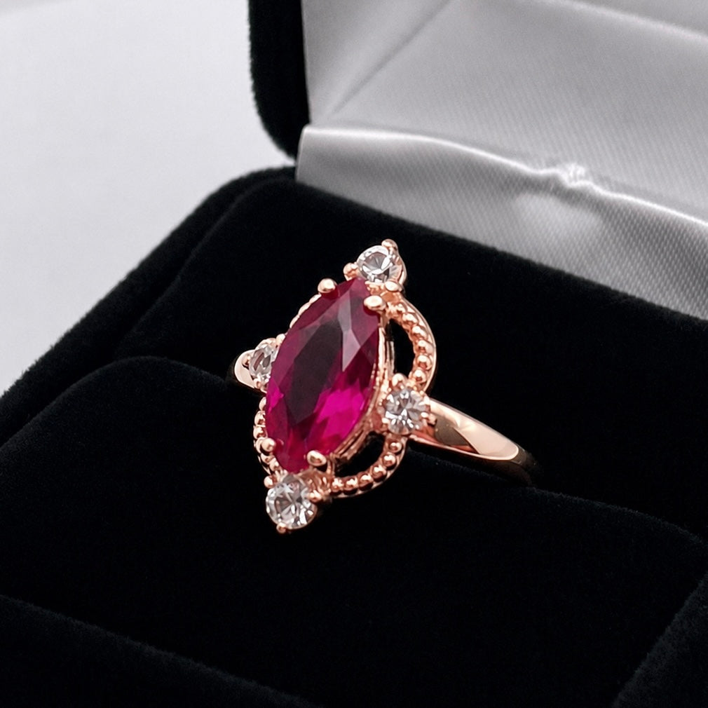 2.4ct Marquise Cut Ruby Ring with Diamond Accents | Vintage Inspired Sculptural Design