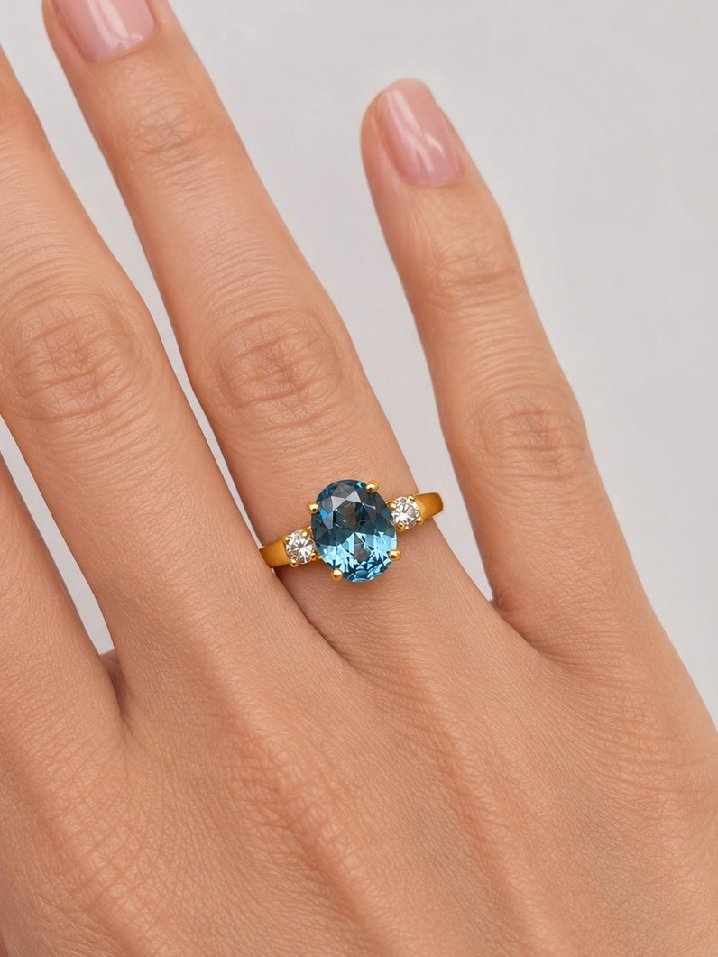 2.6CTW Oval Cut Blue Topaz Ring | White Sapphire Accents