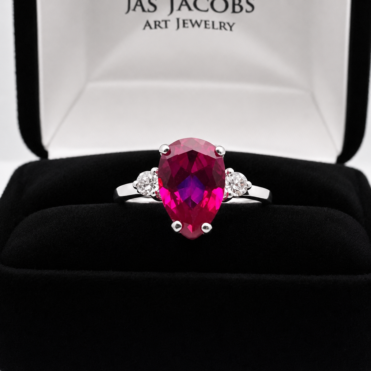 4.7CTW Pear Cut Ruby Ring with White Sapphire Accents