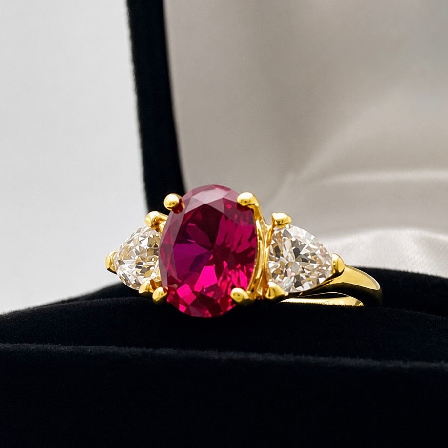 4.5ctw Oval Cut Ruby & Trillion Cut White Sapphire Three Stone Ring