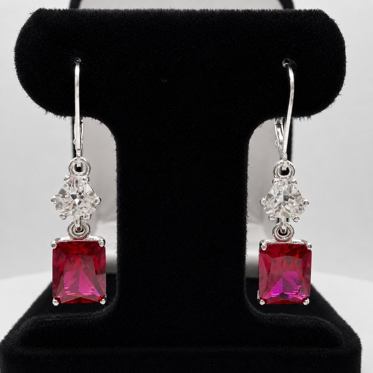 9ctw Emerald Cut Ruby & White Sapphire Dangle Earrings