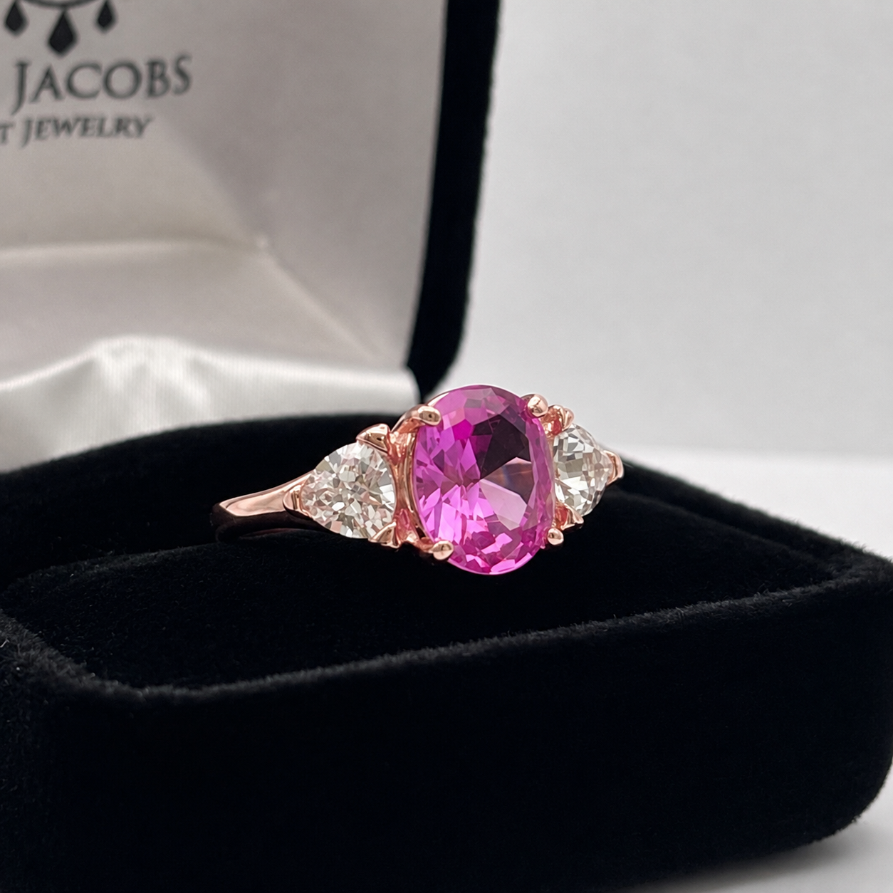 Vivid Pink Sapphire & White Sapphire Three-Stone Ring